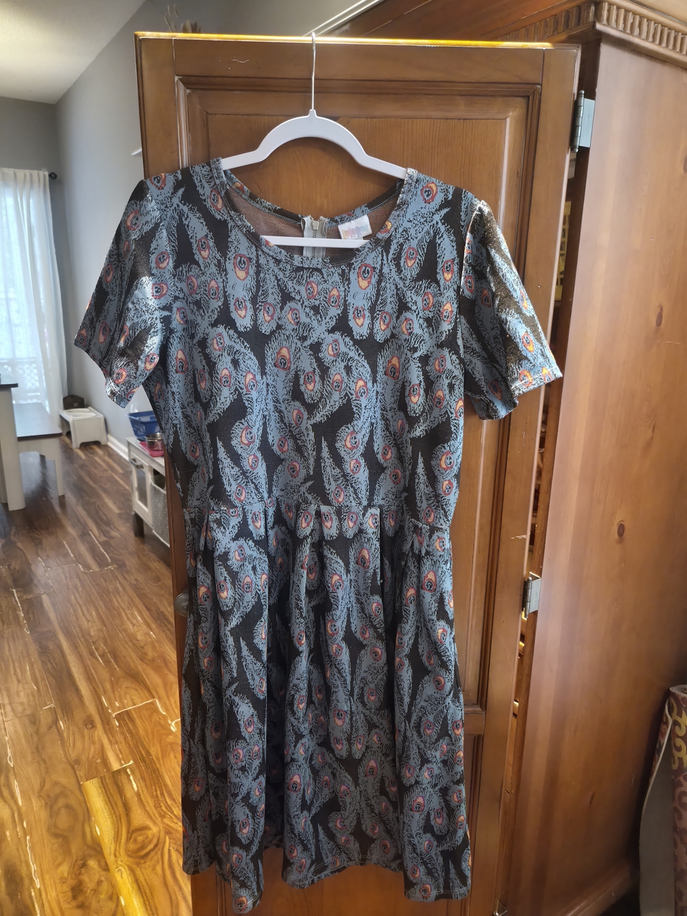 LuLaRoe Black Dress with Blue and Coral Feather Motif